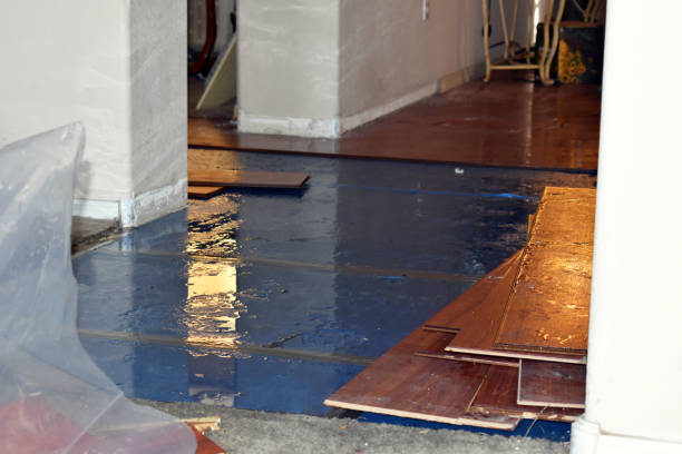 Professional Flood Damage Restoration technician working in Lowell, OR
